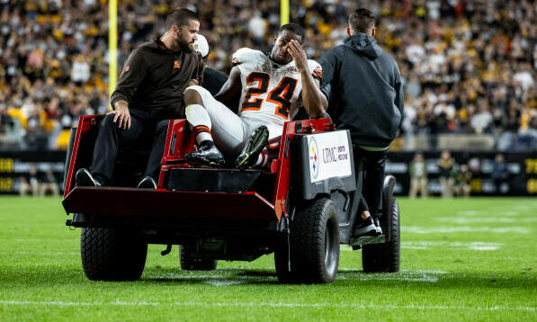 Nick Chubb being carted off the field after sustaining injury