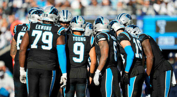 Carolina Panthers in huddle
